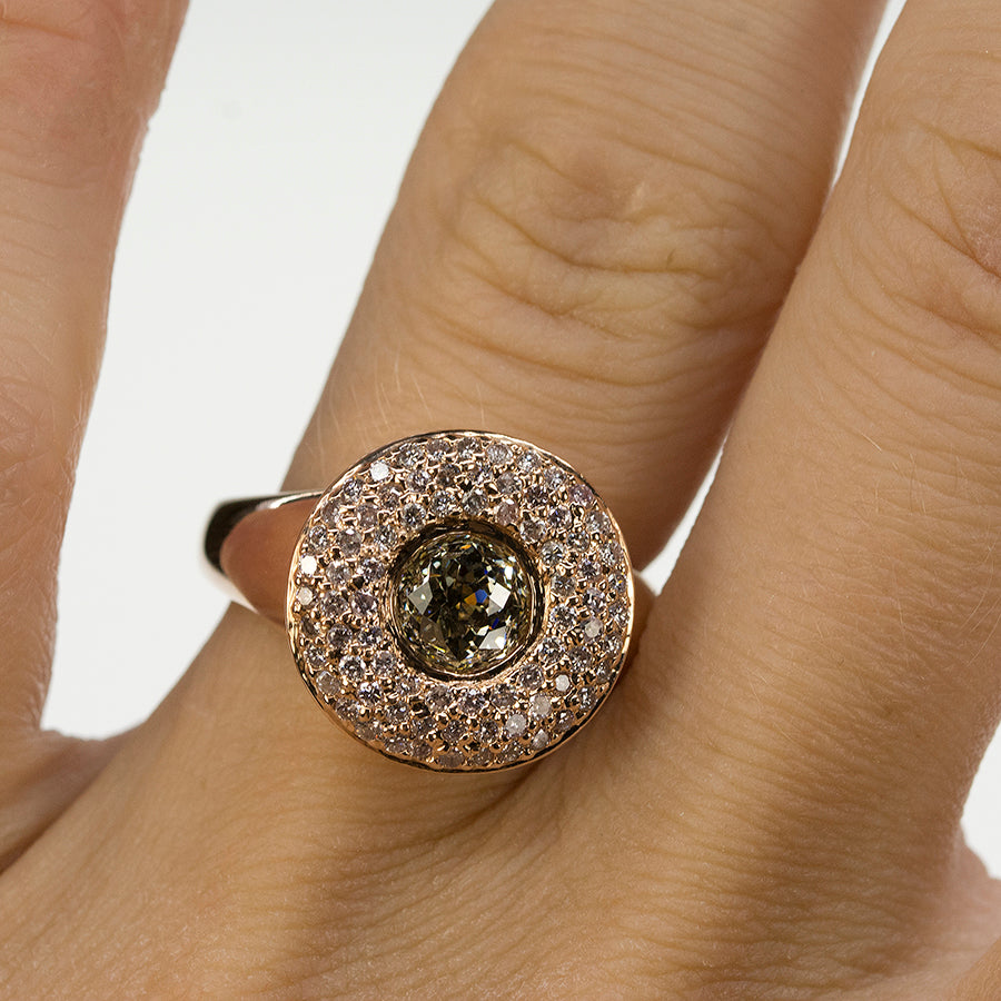 14k Rose gold ring set with one rose cut diamond weighing ap...