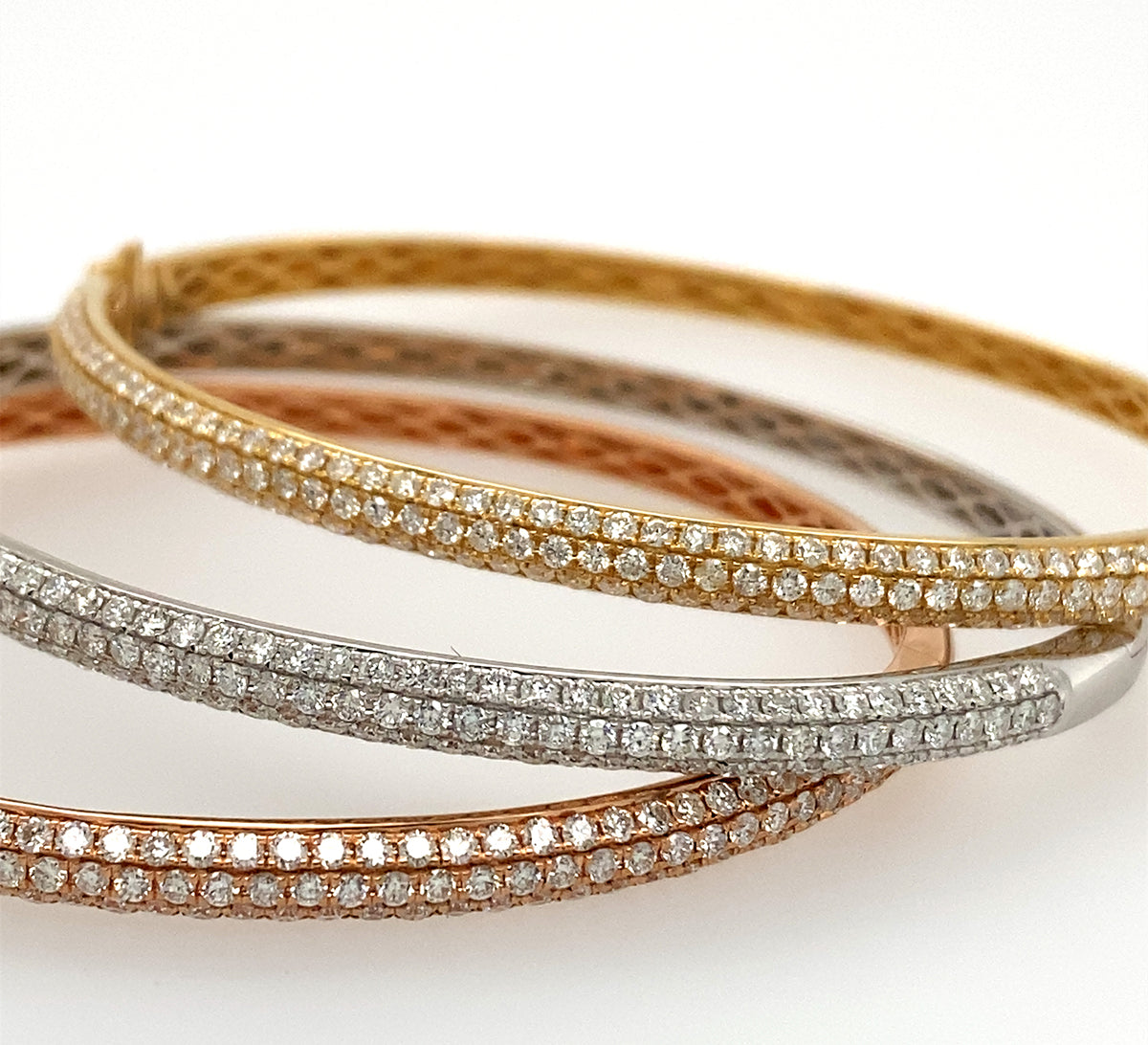 Three 18k Diamond Bangles