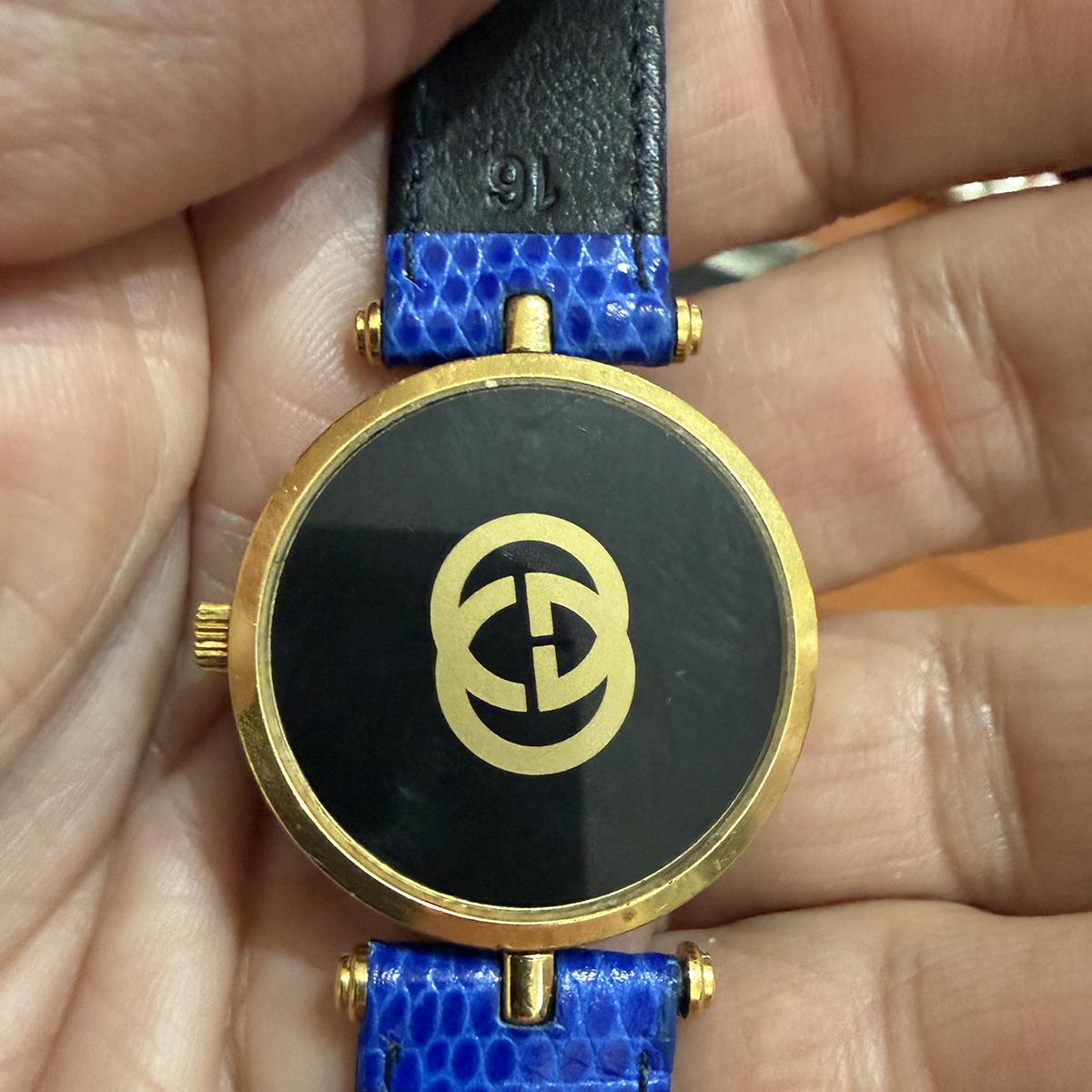 Gucci Watch - Blue Strap Gold-Tone Case Roman Numerals