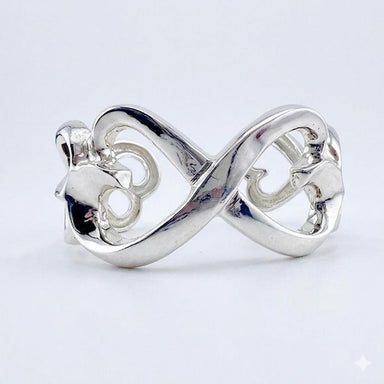 Tiffany & Co. Paloma Picasso Sterling Silver Loving Hearts Bangle Cuff Bracelet