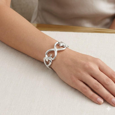 Tiffany & Co. Paloma Picasso Sterling Silver Loving Hearts Bangle Cuff Bracelet