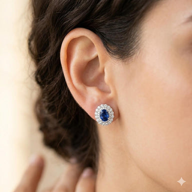 Platinum Earrings with Oval Blue Sapphires and White Diamonds