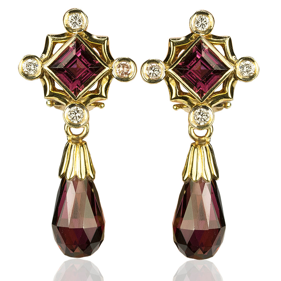 14k Earrrings with 4 rhodolite garnets and 0.34 carats of ro...