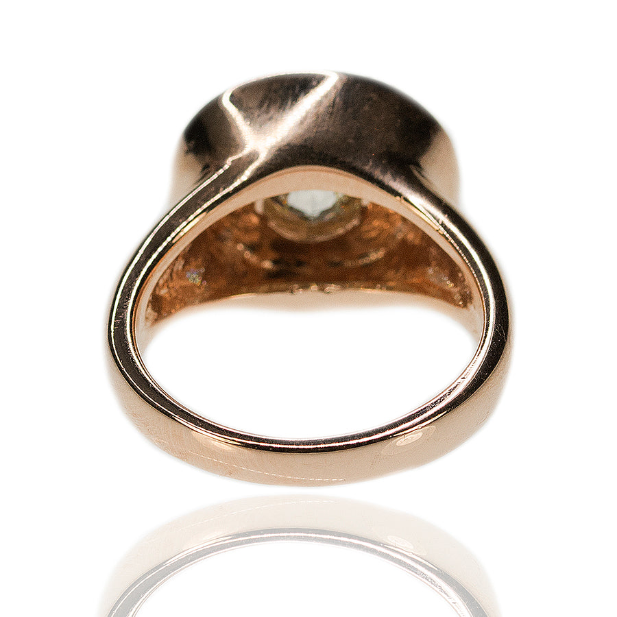 14k Rose gold ring set with one rose cut diamond weighing ap...