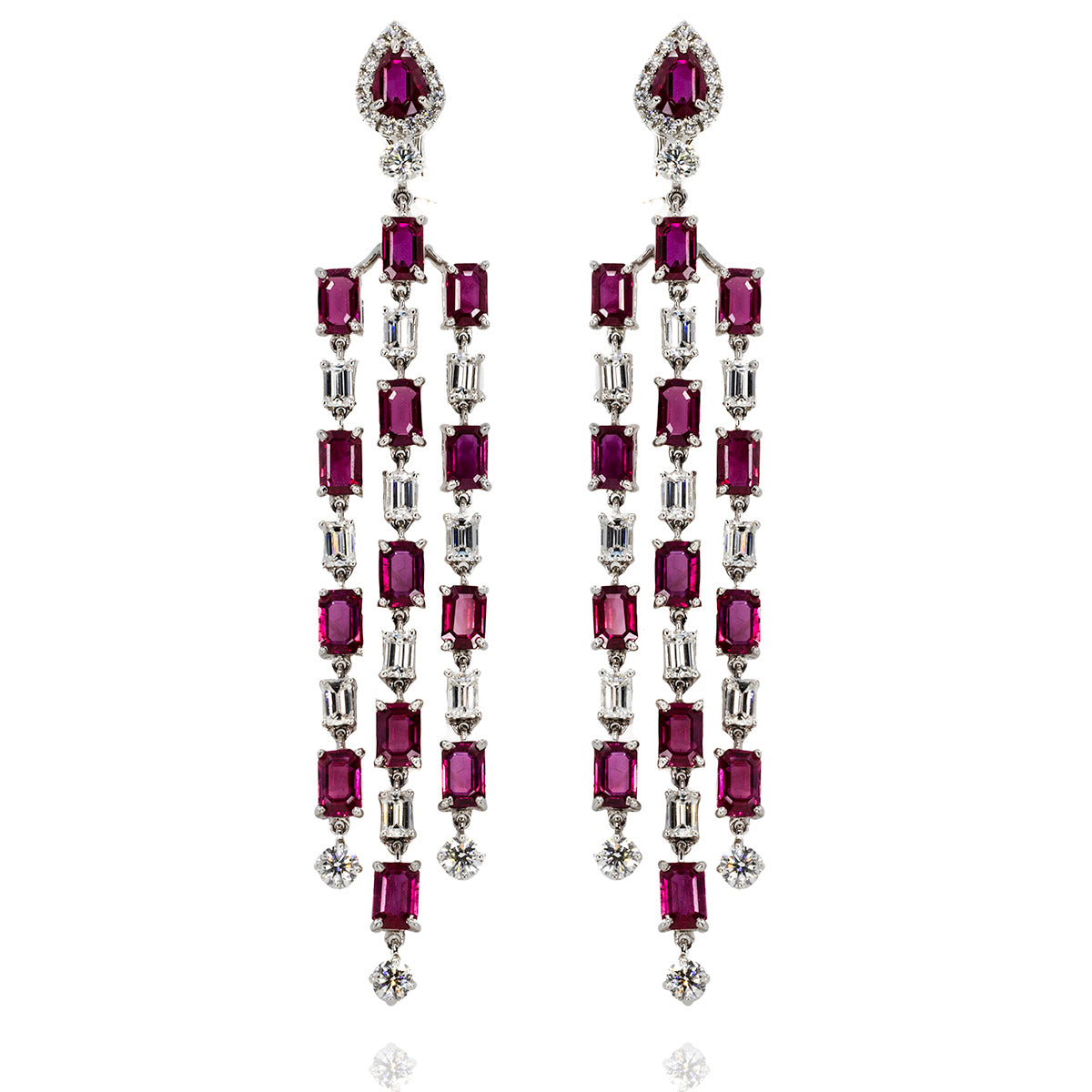 18k White gold earrings with 28 rubies weighing 17.16 carats...